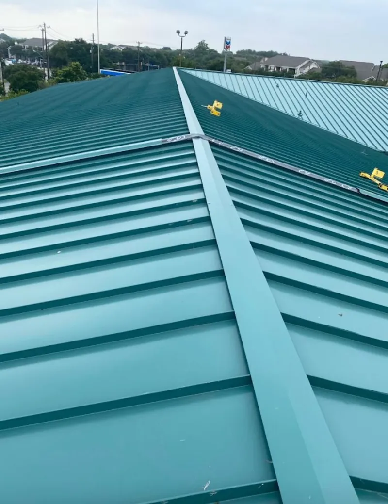 Green commercial metal roof ridge and valley for Metal Roof Repair in Alabaster